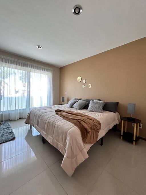 Casa Bon Ubicada En Nueva Galicia Residencial, Es Propiedad Completa Al Sur De La Ciudad Que Te Ofrece Modernidad, Espacio, Tranquilidad, Cuenta Con 4 Recamaras 3 Banos Completos Y 2 Cajones De Estacionamiento Privados Holiday home Guadalajara