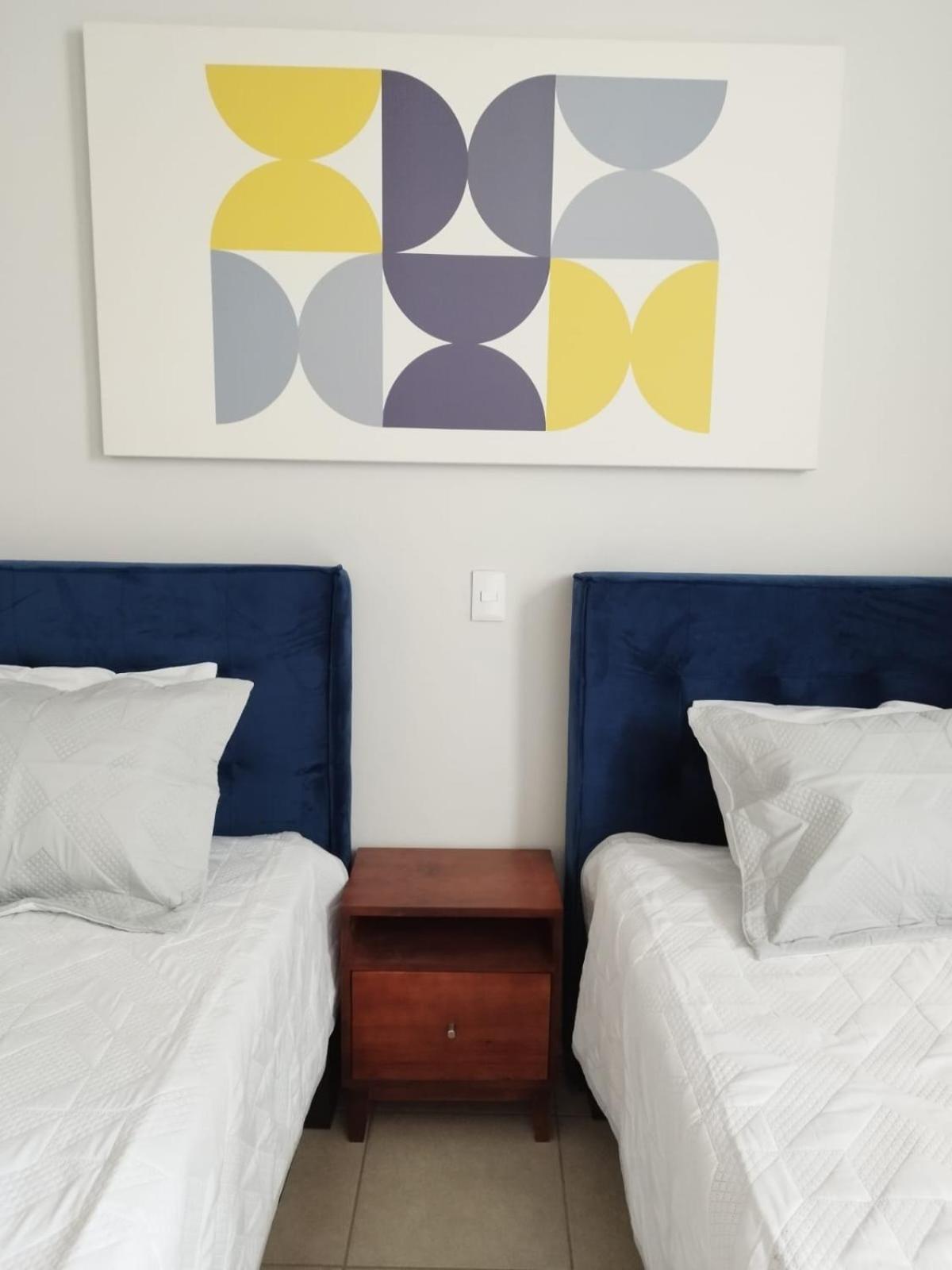 Camas Individuales D2 Habitación en casa particular *